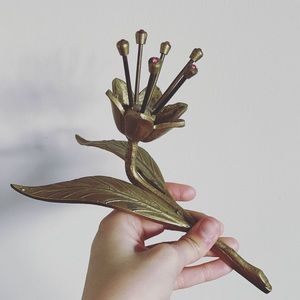 Vintage brass flower with red jewels